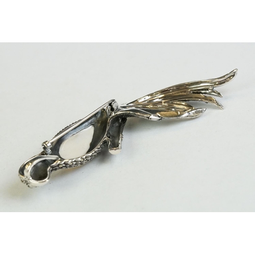 175 - A large silver, marcasite and moonstone pendant-brooch in the form of a parrot