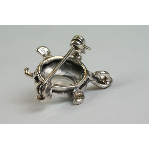 178 - A silver moonstone tortoise brooch-pendant