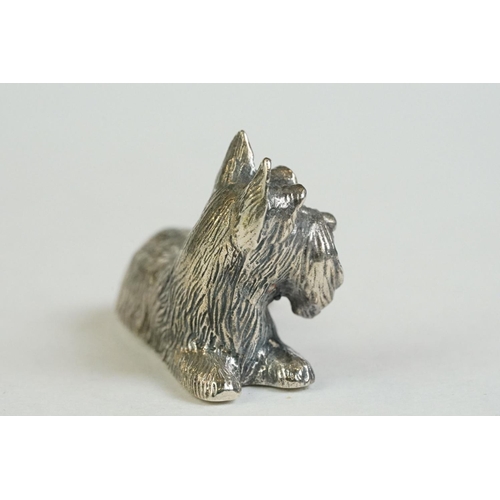 181 - A silver dog figure