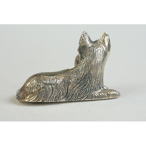 181 - A silver dog figure