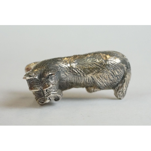 181 - A silver dog figure