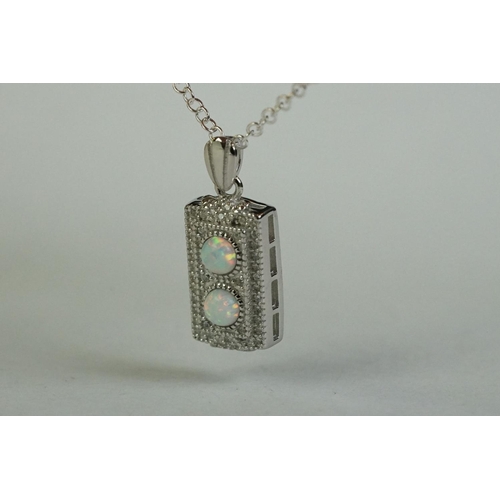 186 - A silver, CZ and opal panelled pendant necklace