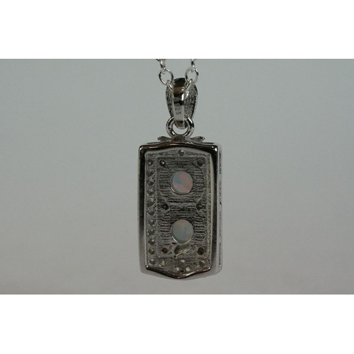 186 - A silver, CZ and opal panelled pendant necklace