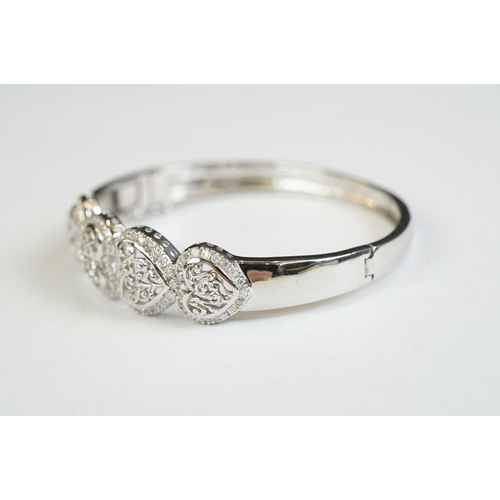 187 - A silver and CZ heart set bangle