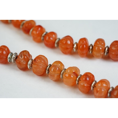 190 - A carved stone beaded earring and necklace set with pumpkin shaped beaded and leaf clasp.