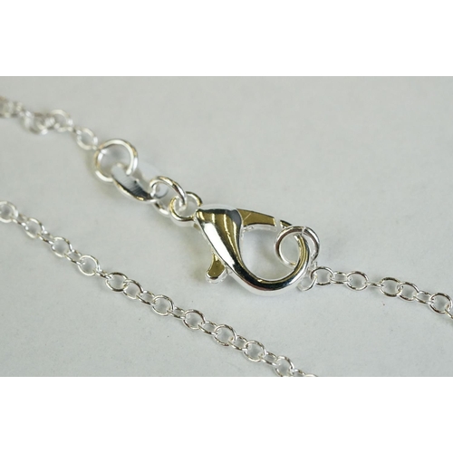 192 - A silver pendant necklace, bee