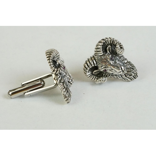 199 - A pair of large silver rams head cufflinks