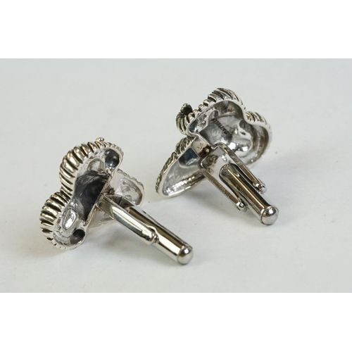 199 - A pair of large silver rams head cufflinks