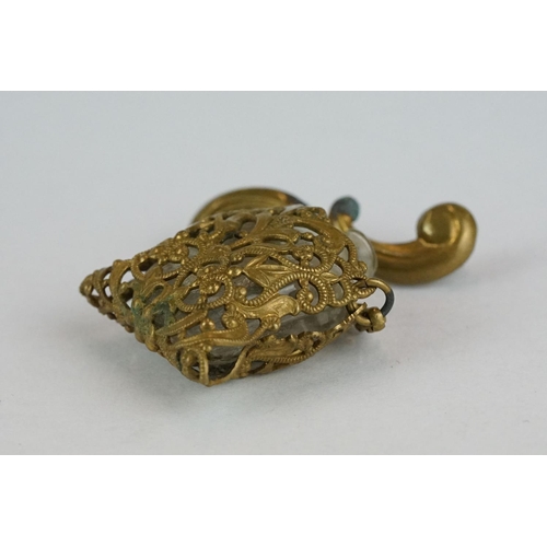 260 - 19th century miniature scent bottle contained within pierced cover suspended from a bar brooch, hing... 