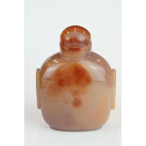 271 - Banded agate carnelian snuff bottle, carved lion mask motifs, height approx 10.5cm

Provenance: from... 