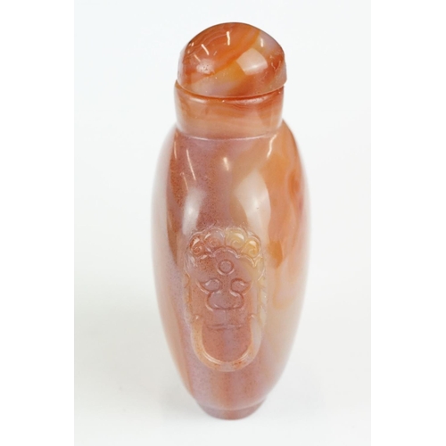 271 - Banded agate carnelian snuff bottle, carved lion mask motifs, height approx 10.5cm

Provenance: from... 