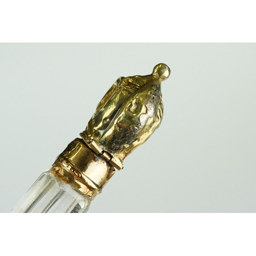 274 - Late 18th century glass scent bottle, tapered faceted form with bulbous base, yellow metal mounts, c... 