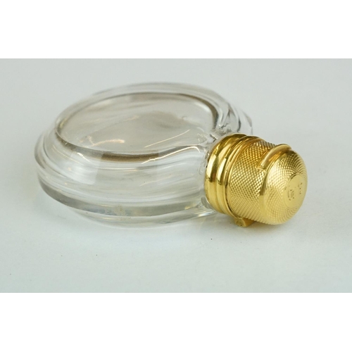 276 - 19th century circular glass scent bottle with yellow metal mounts, original glass stopper, the hinge... 