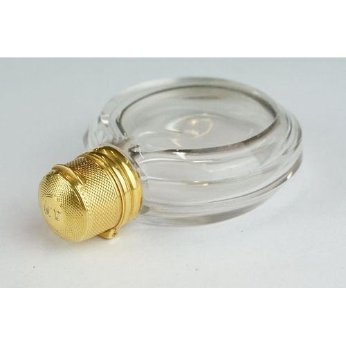 276 - 19th century circular glass scent bottle with yellow metal mounts, original glass stopper, the hinge... 