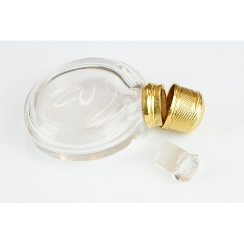 276 - 19th century circular glass scent bottle with yellow metal mounts, original glass stopper, the hinge... 