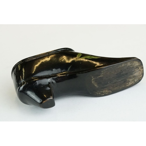 279 - 19th century snuff box modelled as a ladies shoe, lacquered with floral decoration, hinged lid, leng... 