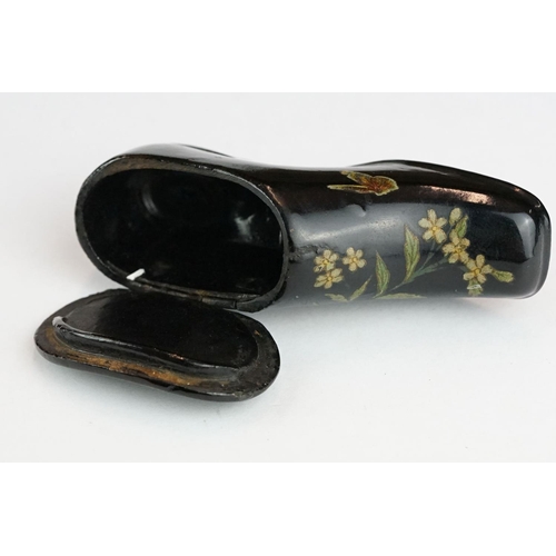 279 - 19th century snuff box modelled as a ladies shoe, lacquered with floral decoration, hinged lid, leng... 