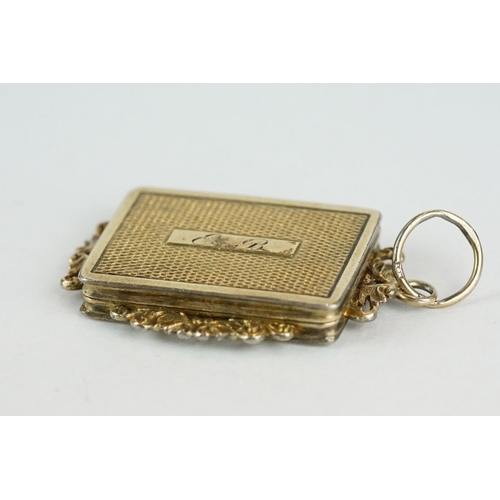 284 - Continental gilt snuff box, rectangular form with pierced cast foliate surmounts, engraved initials ... 