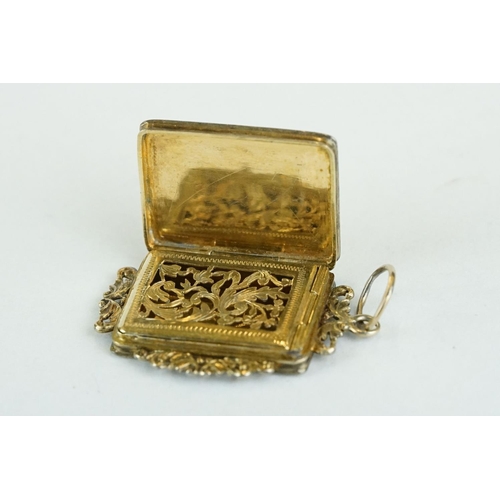 284 - Continental gilt snuff box, rectangular form with pierced cast foliate surmounts, engraved initials ... 