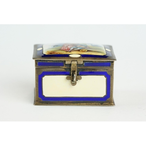 286 - German enamelled silver pill box, the hinged lid depicting a musician serenading his Lady, plain blu... 