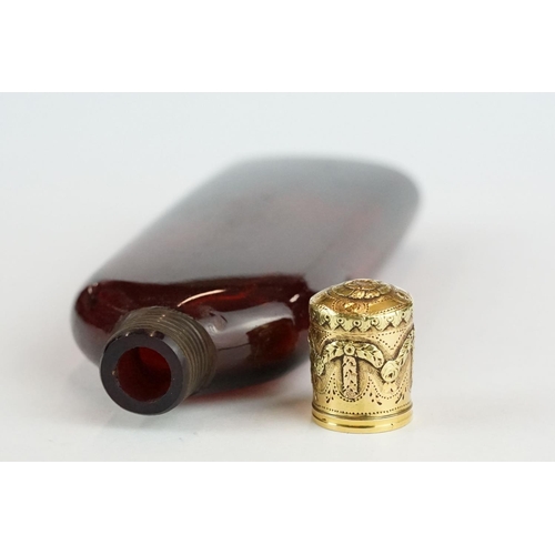 290 - 18th century French lay down ruby glass scent bottle, plain polished tapered body, the yellow and ro... 