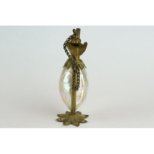 305 - 19th century Continental scent bottle modelled as a footed jug, mother-of-pearl body, brass mounts, ... 