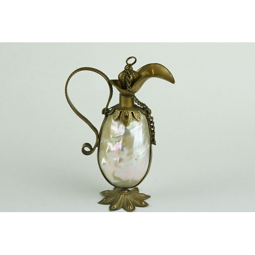 305 - 19th century Continental scent bottle modelled as a footed jug, mother-of-pearl body, brass mounts, ... 