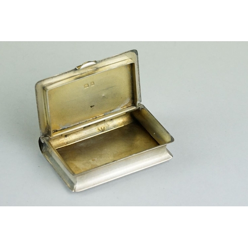 306 - Silver snuff box modelled as a book 