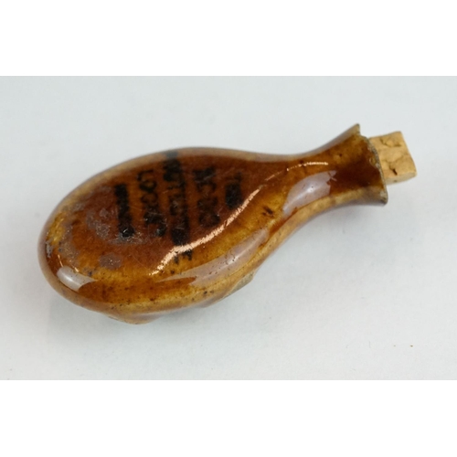 307 - 19th century miniature porcelain scent bottle, treacle glaze with matt flower head decoration, cork ... 