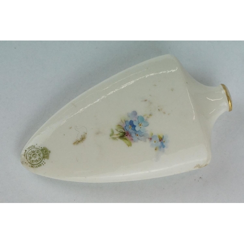 309 - Early 20th century ceramic scent bottle, tapered shield-shaped form with hand painted rose and forge... 