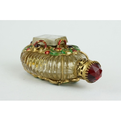 313 - Czechoslovakia glass scent bottle, applied cast metal gilt and painted holder, with red glass caboch... 