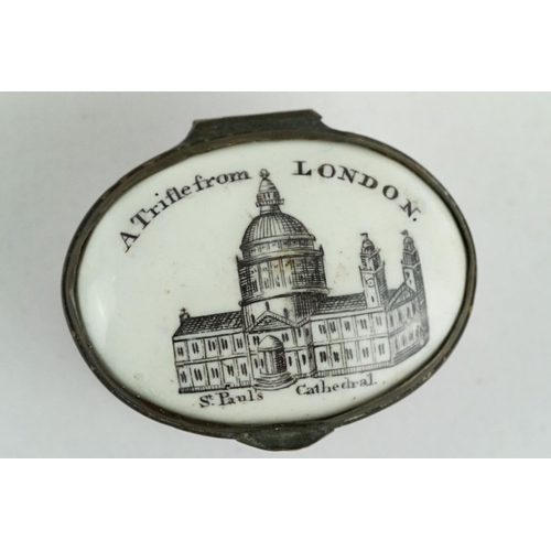 316 - George III enamel patch box, the hinged lid depicting St. Paul's Cathedral with the words 