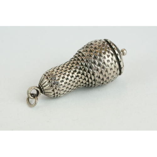 318 - German unmarked silver pomander, circa 1760, textured body, screw cap, length approx 3.5cm

Provenan... 