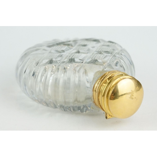 319 - 19th century gold mounted cut glass scent bottle, circular body, original stopper, gold mount and hi... 