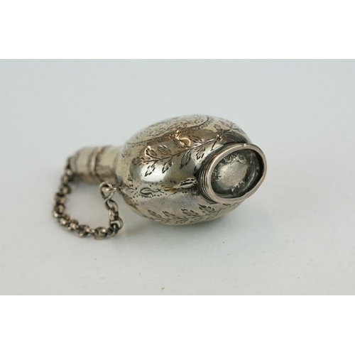 321 - 18th century unmarked silver scent bottle, screw top lid and safety chain, engraved floral and folia... 