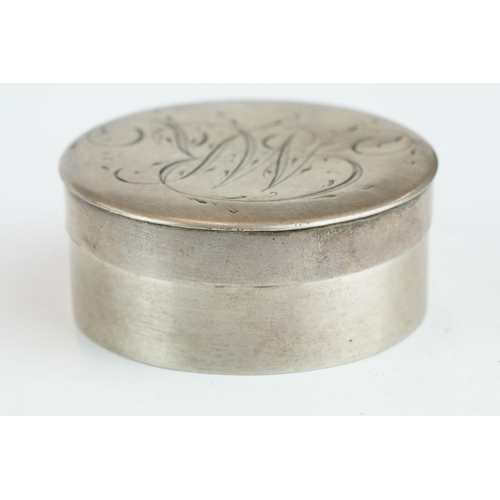 327 - White metal circular pill box, engraved initials to the lid, diameter approx 5.5cm

Provenance: from... 