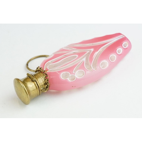 328 - 19th century French glass and brass scent bottle, the colourless glass scent bottle with pink glass ... 