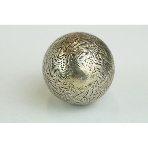 330 - White metal pomander of egg form, punched zig zag decoration, height approx 4cm

Provenance: from th... 