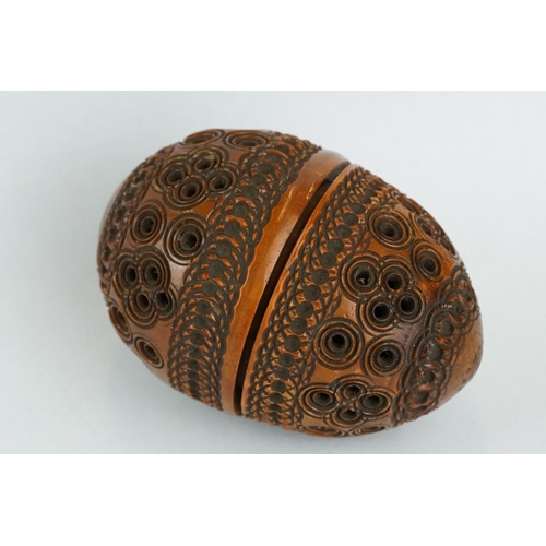 333 - Coquilla nut pomander with carved and pierced repeating circle decoration, length approx 7cm

Proven... 