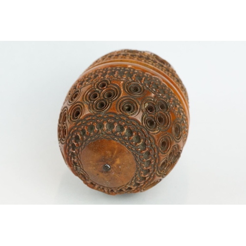 333 - Coquilla nut pomander with carved and pierced repeating circle decoration, length approx 7cm

Proven... 