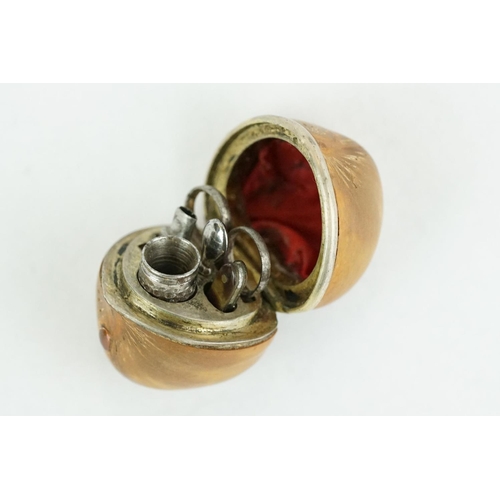 334 - Late 19th century miniature etui contained within a hazlenut, containing miniature scissors, thimble... 