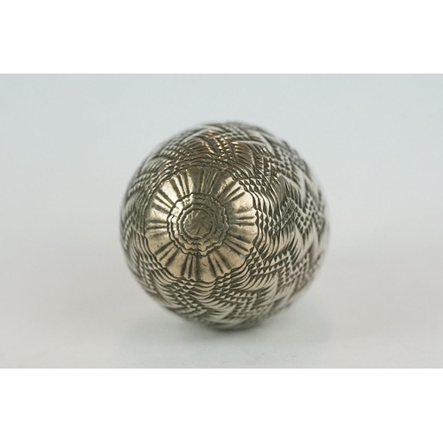 340 - Unmarked silver pomander, modelled as an egg with punched and engraved zig zag decoration, circa 170... 