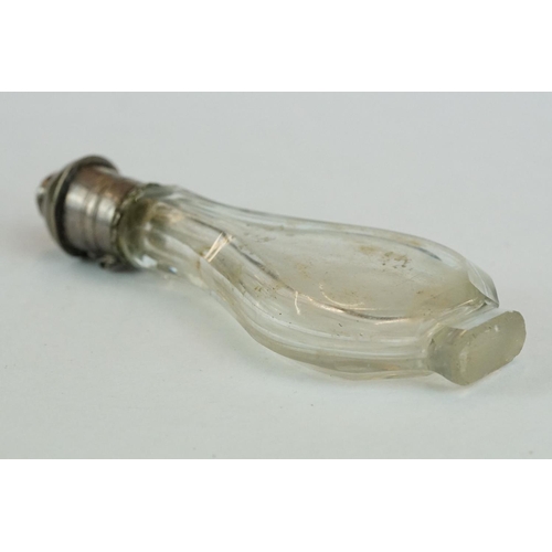 343 - 17th century/ 18th century glass footed scent bottle, white metal hinged lid with faceted crystal fo... 