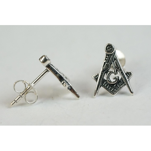 347 - A pair of silver stud masonic earrings