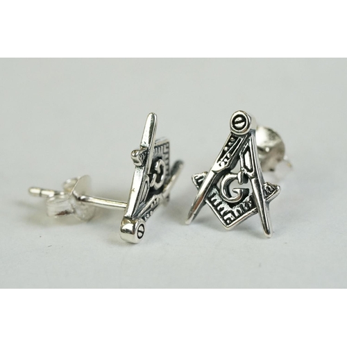 347 - A pair of silver stud masonic earrings