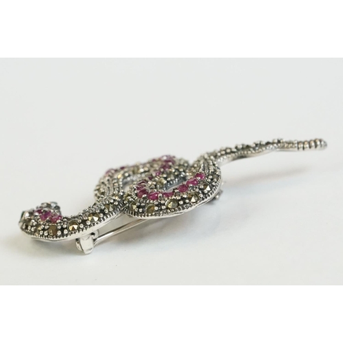 351 - A silver, marcasite and ruby set snake brooch