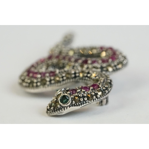 351 - A silver, marcasite and ruby set snake brooch