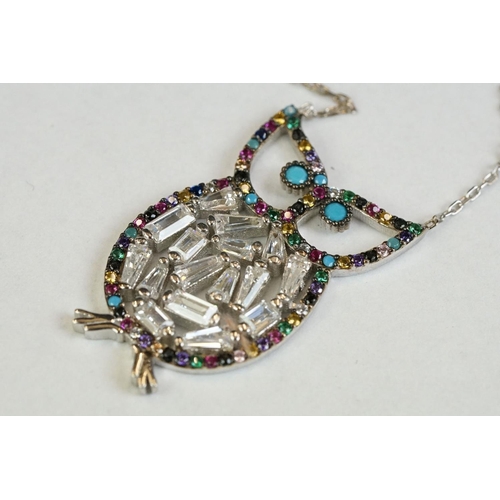 355 - A silver owl shaped necklace set with semi-precious stones