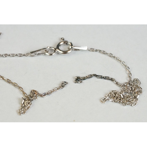 355 - A silver owl shaped necklace set with semi-precious stones