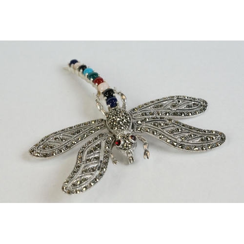 356 - A silver dragonfly brooch set with marcasites, sapphires, rubies etc